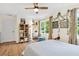 Bright bedroom featuring hardwood floors, plenty of natural light, and stylish decor at 2296 N Shallowford Rd, Atlanta, GA 30341