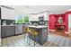 Modern kitchen with gray and white cabinets, subway tile backsplash, and quartz countertops at 2296 N Shallowford Rd, Atlanta, GA 30341
