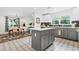 Spacious kitchen with a large island, stainless steel appliances, and open dining area at 2296 N Shallowford Rd, Atlanta, GA 30341
