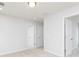 Neutral bedroom boasts plush carpeting and ample natural light at 3025 Cambridge Mill St, Acworth, GA 30102
