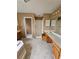 Bathroom featuring double sinks, a separate shower, and ample counter space at 3502 Tiffany Se Dr, Conyers, GA 30013