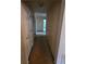 Neutral hallway offering a glimpse into the home's layout at 3502 Tiffany Se Dr, Conyers, GA 30013