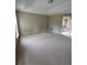 Spacious main bedroom with a trey ceiling, carpet and neutral paint at 3502 Tiffany Se Dr, Conyers, GA 30013