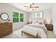 Cozy bedroom with soft natural light, neutral color palette and stylish furnishings at 3702 Running Fox Dr, Marietta, GA 30062