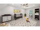 Bright Bedroom featuring a charming crib, whimsical decor, and a playful polka dot rug at 3702 Running Fox Dr, Marietta, GA 30062
