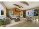 Cozy covered patio with comfortable seating, a ceiling fan, and natural wood finishes at 3702 Running Fox Dr, Marietta, GA 30062