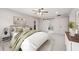 Comfortable main bedroom features a ceiling fan, plush carpet, and modern decor at 3702 Running Fox Dr, Marietta, GA 30062