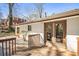 The backyard deck has ample space for outdoor dining and relaxation at 46 Cooper Lake Sw Rd, Mableton, GA 30126