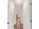 Bright hallway features modern wood-look floors and neutral paint at 46 Cooper Lake Sw Rd, Mableton, GA 30126