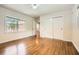 A comfortable bedroom with hardwood floors and a large closet at 739 Pinehill Se Dr, Smyrna, GA 30080
