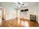 Bedroom with hardwood floors and natural light from large windows at 739 Pinehill Se Dr, Smyrna, GA 30080