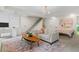 Open floor plan with living area, work space and bedroom bathed in natural light and neutral tones at 11785 Mountain Laurel Dr, Roswell, GA 30075