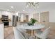 Beautiful kitchen features a breakfast area and stainless steel appliances and granite countertops at 11785 Mountain Laurel Dr, Roswell, GA 30075