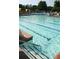 Outdoor swimming pool with clear blue water and multiple lanes for swimming laps at 11785 Mountain Laurel Dr, Roswell, GA 30075