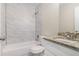 Bathroom featuring tiled shower over tub and granite countertop at 2083 Green Forrest Dr, Decatur, GA 30032
