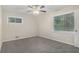 Spacious bedroom with neutral carpet, a ceiling fan, and natural light at 2083 Green Forrest Dr, Decatur, GA 30032