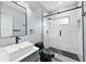 Modern bathroom featuring a vessel sink, sleek black fixtures, and frameless shower at 2412 Boulder Se Rd, Atlanta, GA 30316