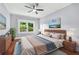 Serene bedroom with a large window, comfortable bed, and stylish decor for relaxation at 2412 Boulder Se Rd, Atlanta, GA 30316