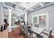 Open concept dining area featuring coffered ceilings, hardwood floors, and bright, natural light at 2412 Boulder Se Rd, Atlanta, GA 30316