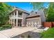 Beautiful two-story home with a spacious driveway, lush landscaping, and a two-car garage at 2412 Boulder Se Rd, Atlanta, GA 30316