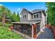 Charming two-story home with a screened-in porch and landscaped backyard, offering a private outdoor space at 2412 Boulder Se Rd, Atlanta, GA 30316