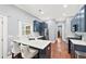 Kitchen featuring white countertops, hardwood floors, stainless steel appliances, and blue cabinets at 2412 Boulder Se Rd, Atlanta, GA 30316