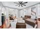 Spacious living room featuring hardwood floors, coffered ceilings, and large windows at 2412 Boulder Se Rd, Atlanta, GA 30316