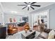 Open concept living space with hardwood floors, large windows and an eat-in kitchen at 2412 Boulder Se Rd, Atlanta, GA 30316