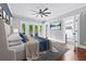 Spacious main bedroom with hardwood floors, bright windows, and access to a private balcony at 2412 Boulder Se Rd, Atlanta, GA 30316