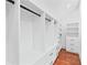 Spacious walk-in closet boasts custom shelving and drawers, providing ample storage space at 2412 Boulder Se Rd, Atlanta, GA 30316