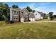 Two-story brick home with a well-maintained lawn and a two-car garage at 3517 Mortons Landing Dr, Ellenwood, GA 30294