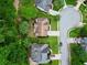 Aerial view of the property and neighboring houses highlights landscaped yards and mature trees at 4360 Canterbury Walk Dr, Duluth, GA 30097
