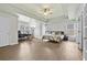 Spacious primary bedroom featuring trey ceiling, wood floors and double doors at 4360 Canterbury Walk Dr, Duluth, GA 30097