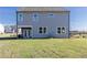 New home construction featuring freshly laid sod and a gray-tone exterior elevation at 505 Regency Trl, Acworth, GA 30102