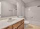 Bathroom featuring a vanity, mirror, toilet and a shower-tub combination at 1417 Poplar Pointe Se, Smyrna, GA 30082