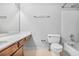 Bathroom featuring vanity, tile flooring, toilet and shower and tub at 1417 Poplar Pointe Se, Smyrna, GA 30082
