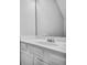 Clean bathroom with vanity and sink featuring white countertops and cabinets at 1417 Poplar Pointe Se, Smyrna, GA 30082