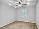 Bedroom featuring neutral paint, ceiling fan and natural light at 1417 Poplar Pointe Se, Smyrna, GA 30082