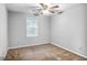Bedroom with neutral paint, ceiling fan and natural light at 1417 Poplar Pointe Se, Smyrna, GA 30082