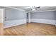 Open-concept living area with hardwood floors, neutral paint, and ample space at 1417 Poplar Pointe Se, Smyrna, GA 30082