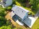 Aerial view of home with large private drive, large yard, and screened in porch at 1428 Brookcliff Dr, Marietta, GA 30062