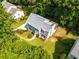 Inviting two-story home with a pristine lawn, mature trees, and a charming walkway enhancing the curb appeal at 1428 Brookcliff Dr, Marietta, GA 30062
