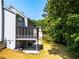 Enjoy the private backyard with screened porch and mature landscaping at 1428 Brookcliff Dr, Marietta, GA 30062