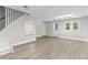 Finished basement boasts new floors, natural light, and access to the backyard at 1428 Brookcliff Dr, Marietta, GA 30062