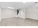 Finished basement boasts new floors, recessed lighting, and stairs to upper level at 1428 Brookcliff Dr, Marietta, GA 30062