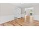 Dining room with hardwood floors, paneled walls, closet and windows to the side at 1428 Brookcliff Dr, Marietta, GA 30062
