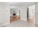 Open kitchen with tile flooring leading to the living room featuring a fireplace at 1428 Brookcliff Dr, Marietta, GA 30062