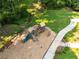 Playground area featuring a slide, climbing structure, and a winding sidewalk through landscaped gardens at 1428 Brookcliff Dr, Marietta, GA 30062