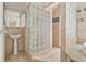 Bathroom with glass block shower and pedestal sink at 6771 Sunny Brook Ln, Atlanta, GA 30328