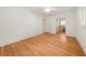 Spacious bedroom with beautiful hardwood floors, opening to an ensuite bathroom at 6771 Sunny Brook Ln, Atlanta, GA 30328